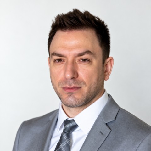 Professional portrait of Matt Homco.